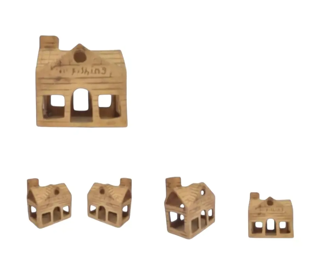  ديكور فخار صغير على شكل منزل