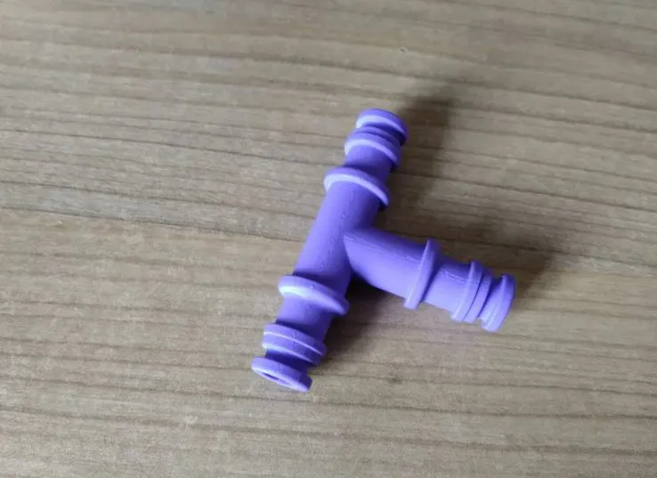 وصلة خرطوم على شكل حرف T 